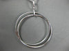 LARGE 1.25CT DIAMOND & SAPPHIRE 18KT WHITE GOLD 3D CIRCULAR INTERTWINING PENDANT