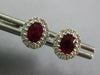1CT DIAMOND & AAA RUBY 18KT WHITE GOLD OVAL & ROUND FLOWER CLASSIC STUD EARRINGS