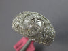 LARGE 5.12CT DIAMOND 18KT WHITE GOLD ROUND & BAGUETTE CRISS CROSS INFINITY RING