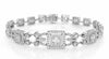 LARGE 4.72CT DIAMOND 18KT WHITE GOLD ROUND & BAGUETTE LOVE KNOT TENNIS BRACELET