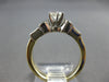 ESTATE .88CT DIAMOND 14KT 2 TONE GOLD 3D ROUND & BAGUETTE ENGAGEMENT RING #27991