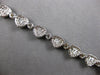 LARGE 3.79CT DIAMOND 18K WHITE GOLD ROUND & BAGUETTE MULTI HEART TENNIS BRACELET