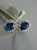 WIDE 1.23CT DIAMOND & AAA SAPPHIRE 18KT WHITE GOLD OVAL & ROUND CRISS CROSS RING