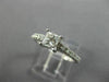 ESTATE .66CT ROUND & PRINCESS DIAMOND 14KT WHITE GOLD SOLITAIRE ENGAGEMENT RING