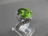 ESTATE WIDE 4.15CT DIAMOND & AAA PERIDOT 14KT WHITE GOLD OVAL INFINITY FUN RING