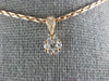 ESTATE SMALL .19CT DIAMOND 18KT ROSE GOLD 3D CLUSTER FLOWER LOVE PENDANT
