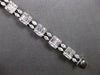 EXTRA LARGE 3.67CT DIAMOND 18KT WHITE GOLD 3D ROUND & BAGUETTE TENNIS BRACELET
