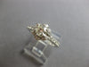 ESTATE .73CT DIAMOND 18KT WHITE GOLD 3D ROUND FLOWER ENGAGEMENT RING