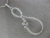 ESTATE LARGE .42CT ROUND DIAMOND 14KT WHITE GOLD 3D INFINITY FLOWER LOVE PENDANT
