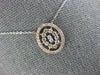 ESTATE .41CT DIAMOND 14KT WHITE AND ROSE GOLD 3D OVAL BY THE YARD LOVE PENDANT