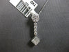 .50CT DIAMOND 14KT WHITE GOLD ROUND & PRINCESS INVISIBLE FLOWER FLOATING PENDANT