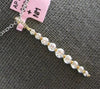 ESTATE .77CT DIAMOND 14KT YELLOW GOLD JOURNEY SHARED PRONG BAR FLOATING PENDANT