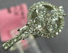 ESTATE .86CT DIAMOND 18KT WHITE GOLD 3D ROUND & PRINCESS FLOWER HALO LOVE RING