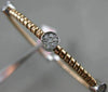 ESTATE .21CT DIAMOND 14KT WHITE & ROSE GOLD PAST PRESENT FUTURE BANGLE BRACELET