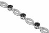 ESTATE 3.20CT WHITE & BLACK DIAMOND 14KT WHITE GOLD 3D FLOWER TENNIS BRACELET