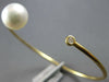 .06CT DIAMOND & AAA SOUTH SEA PEARL 18KT YELLOW GOLD 3D FLEXIBLE BANGLE BRACELET