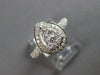 .70CT DIAMOND 18KT WHITE GOLD 3D CLASSIC ROUND CLUSTER PEAR SHAPE HALO LOVE RING