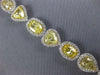 EXTRA LARGE 19.42CT WHITE & FANCY YELLOW DIAMOND 18KT WHITE GOLD TENNIS BRACELET