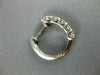 ESTATE .80CT DIAMOND 18KT WHITE GOLD CHANNEL 5 STONE ROUND HUGGIE HOOP EARRINGS