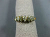 ESTATE .82CT FANCY YELLOW DIAMOND 14KT YELLOW GOLD SEVEN STONE ANNIVERSARY RING