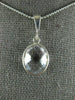 ESTATE AAA CRYSTAL 14KT WHITE GOLD 3D CLASSIC BEZEL OVAL PENDANT