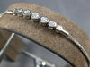 .34CT DIAMOND 18K WHITE GOLD 7 STONE BEZEL GRADUATING ADJUSTABLE TENNIS BRACELET