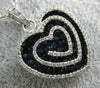 LARGE 1.69CT DIAMOND & AAA SAPPHIRE 18KT WHITE & BLACK GOLD MULTI HEART PENDANT