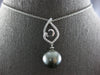 ESTATE LARGE. 15CT DIAMOND & AAA TAHITIAN PEARL 18K WHITE GOLD LOVE KNOT PENDANT