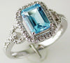 1.97CT DIAMOND & AAA BLUE TOPAZ 14KT WHITE GOLD 3D EMERALD CUT & ROUND HALO RING