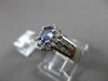 ESTATE 1.08CT DIAMOND & AAA TANZANITE 14KT WHITE GOLD CLUSTER ENGAGEMENT RING
