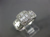 ESTATE WIDE .86CT DIAMOND 18K WHITE GOLD ROUND & BAGUETTE CLUSTER HALO LOVE RING