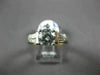 ESTATE .42CT BAGUETTE & ROUND DIAMOND & CUBIC ZIRCONIUM PLATINUM ENGAGEMENT RING