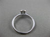 ESTATE .15CT DIAMOND 18KT WHITE GOLD CLASSIC FLOWER HALO BEZEL FRIENDSHIP RING