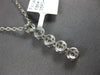 ESTATE 0.48CT DIAMOND 18KT WHITE GOLD MULTI FLOWER JOURNEY LOVE FLOATING PENDANT