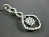 ANTIQUE .67CT ROUND DIAMOND 18KT WHITE GOLD INFINITY FLOATING PENDANT & CHAIN