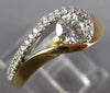 ESTATE .50CT DIAMOND 14K YELLOW GOLD SOLITAIRE LOVE KNOT FRIENDSHIP PROMISE RING