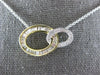 .54CT DIAMOND 14KT 2 TONE GOLD 3D ROUND & BAGUETTE DOUBLE OVAL LOVE KNOT PENDANT