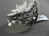 ANTIQUE MASSIVE 1.69CT DIAMOND 18KT BLACK & WHITE GOLD 3D FLORAL ETOILE RING