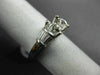 ESTATE .68CT ROUND & BAGUETTE CUT DIAMOND PLATINUM 3D SEMI MOUNT ENGAGEMENT RING