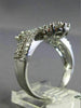 ESTATE LARGE 2.55CT ROUND & BAGUETTE DIAMOND 18KT WHITE GOLD DOUBLE FLOWER RING