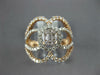 WIDE .97CT DIAMOND 14KT ROSE GOLD 3D ROUND & BAGUETTE INVISIBLE OVAL FLOWER RING