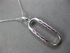 .74CT DIAMOND & AAA RUBY 14K WHITE GOLD 3D BAGUETTE & ROUND FUN FLOATING PENDANT