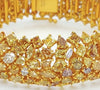 EXTRA LARGE MULTI COLOR 25.43CT DIAMOND 18KT YELLOW GOLD 3D CUFF TENNIS BRACELET