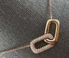 ESTATE .26CT DIAMOND 14K ROSE GOLD 3D RECTANGULAR LOVE KNOT V SHAPE FUN NECKLACE