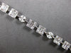 4.22CT DIAMOND 18KT WHITE GOLD ROUND BAGUETTE & MARQUISE SQUARE TENNIS BRACELET