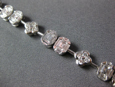 3.98CT DIAMOND 18KT WHITE GOLD INVISIBLE FLOWER OVAL BY THE YARD TENNIS BRACELET
