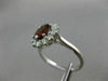 ESTATE 1.45CT DIAMOND & NATURAL GARNET 18KT WHITE GOLD OVAL HALO ENGAGEMENT RING