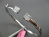 WIDE .72CT DIAMOND 18KT WHITE GOLD 3D ROUND & BAGUETTE FLEXIBLE BANGLE BRACELET