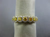 ESTATE .96CT WHITE & FANCY YELLOW DIAMOND 18KT YELLOW GOLD HALO ANNIVERSARY RING