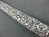 LARGE 13.86CT DIAMOND 18KT WHITE GOLD 3D CLUSTER GRADUATING CUFF TENNIS BRACELET